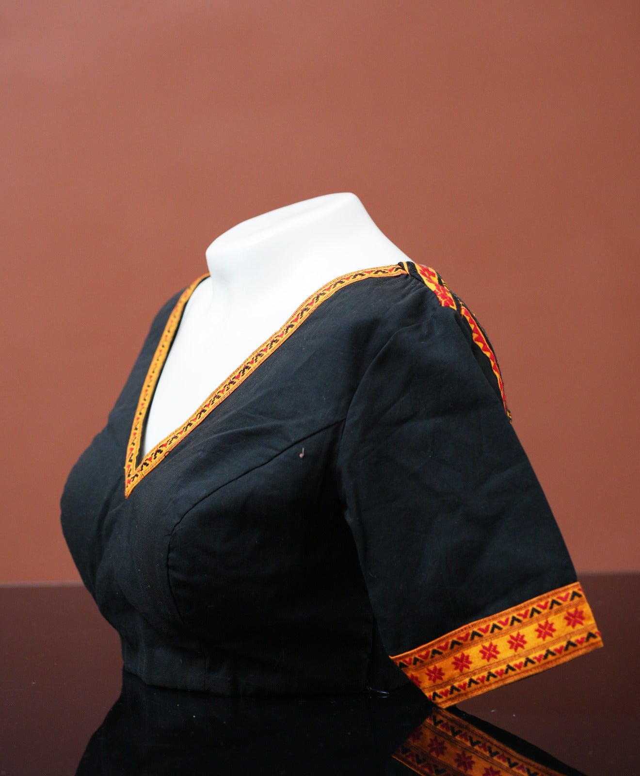 V-NECK BLOUSE WITH TRADITIONAL TIWA MOTIF