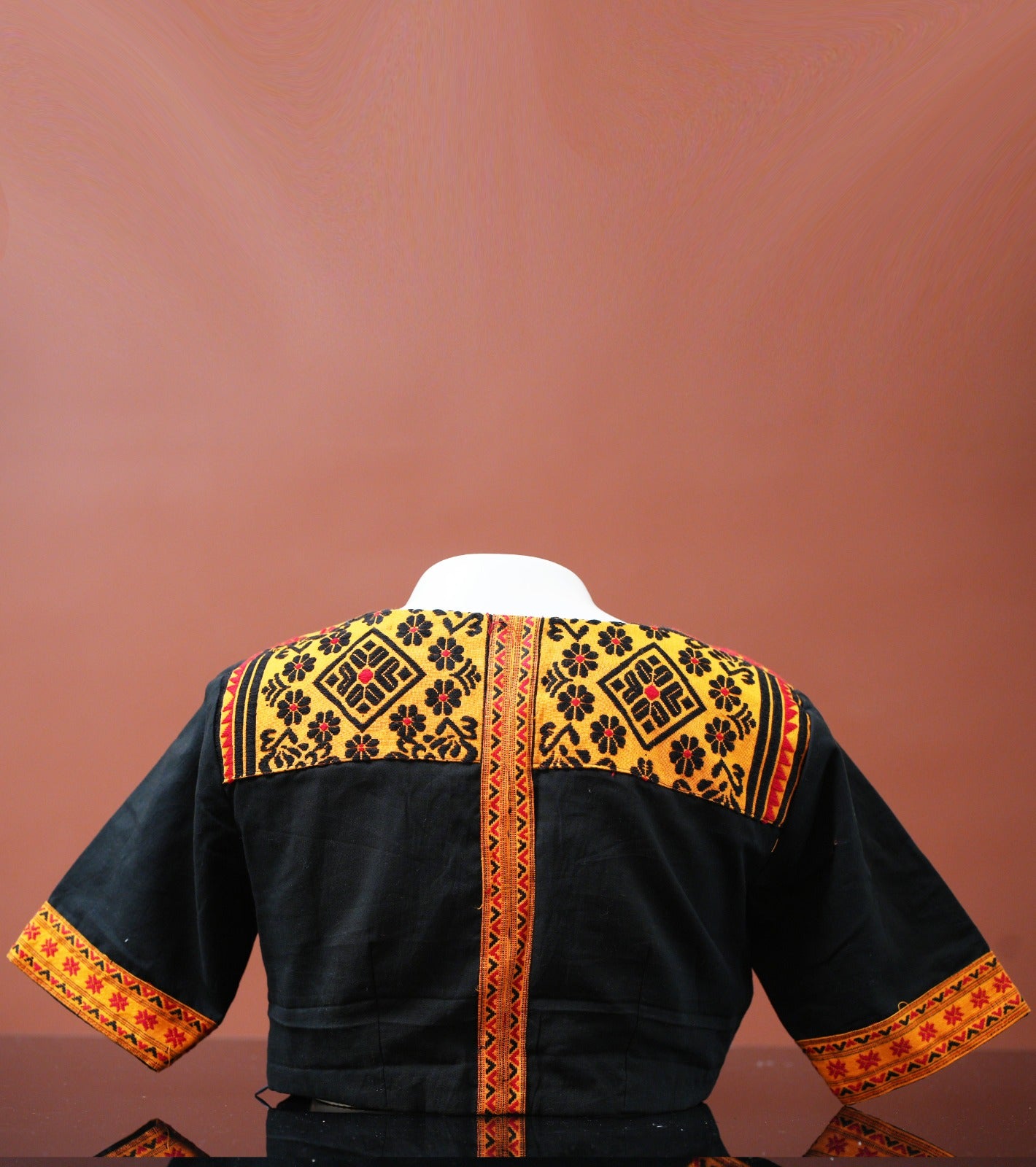 V-NECK BLOUSE WITH TRADITIONAL TIWA MOTIF