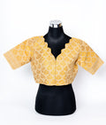 TRADITIONAL ASSAMESE BUTA DESIGNED V- NECK BLOUSE.